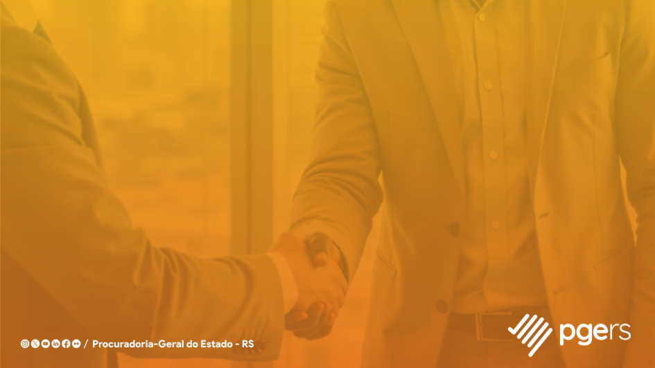 Aperto de m&atilde;os simbolizando um acordo. 